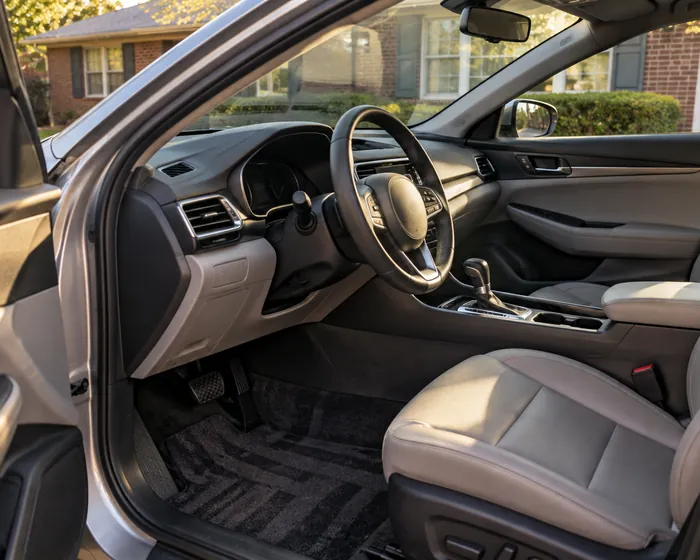 Clean car interior with vacuumed carpet and a wiped dashboard